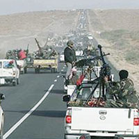  Kaddafi'den koalisyona �a�r�: Barbarca sald�r�y� durdurun 